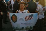 Families of the victims of the terror attacks on the World Trade Center in New York City which killed almost 3,000 people on 11 September 2001 commemorate the 1st anniversary of the tragedy on 11 September 2002.