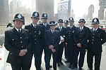 Families of the victims of the terror attacks on the World Trade Center in New York City which killed almost 3,000 people on 11 September 2001 commemorate the 1st anniversary of the tragedy on 11 September 2002.<br>A contingent of British police at Ground Zero.