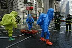 New York City agencies practice mobilizing for a subway terror attack in drill in the Financial District. FDNY, NYPD, EMS, MTA, and OEM conduct search and rescue, investigation, and decontamination simulation. Live volunteers simulate survivors and walking wounded, while dummies are used for serious injuries or dead.