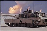 A U.S. Army M1A1 Abrams main battle tank in the burning oil fields of Kuwait, Operation Desert Storm, 1991