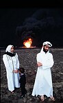 Kuwaiti family looking at burning oil wells near Kuwait City. Al Ahmadi, Kuwait<br>Colonel Saber al-Suwaidah, Kuwaiti officer held hostage in Iraq