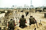 French troops de-mine the beach at Kuwait City after its liberaqtion from Iraq.
