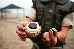 French troops de-mine the beach at Kuwait City after its liberaqtion from Iraq.