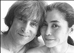 John Lennon and Yoko Ono during the filming of a video to promote their new album, Double Fantasy, New York City, November 26, 1980. Filming began in Central Park, then moved to a gallery on SoHo for scenes where they would arrive in a white bedroom, first in street clothes and later in kimonos, strip, and make love.