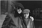 John Lennon and Yoko Ono come out of 5 years' seclusion to promote their new album, Double Fantasy, November 21, 1980. They walked around Central Park, posed in front of the Dakota apartment house, and worked in Studio One, Yoko's office.