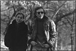 John Lennon and Yoko Ono during the filming of a video to promote their new album, Double Fantasy, New York City, November 26, 1980. Filming began in Central Park, then moved to a gallery on SoHo for scenes where they would arrive in a white bedroom, first in street clothes and later in kimonos, strip, and make love.