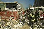 Two hijacked planes crash into the World Trade Center towers. Both towers burn, then collapse.