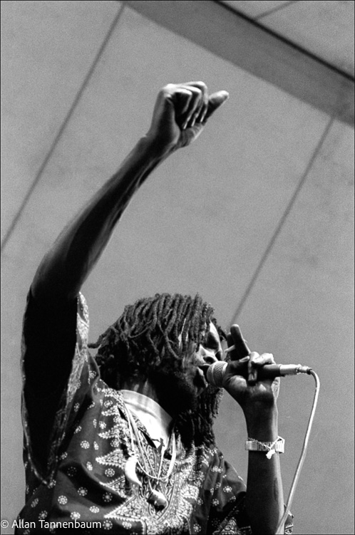 Peter Tosh makes power salute