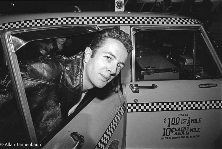 The Clash arrive - Joe Strummer in taxi