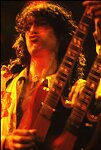 Jimmy Page of Led Zeppelin performs at Madison Square Garden