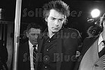Sex Pistols bassist Sid Vicious under arrest for the murder of girlfriend Nancy Spungen, NYC, 10/12/78<br>2320-30<br>From SoHo Blues - A Personal Photographic Diary of New York City in the 1970s by SoHo Weekly News chief photographer Allan Tannenbaum