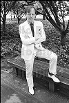 Best-selling author Tom Wolfe in his traditional white suit.<br>NYC 6/75<br>0662-32<br>From SoHo Blues - A Personal Photographic Diary of New York City in the 1970s by SoHo Weekly News chief photographer Allan Tannenbaum