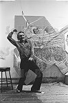 Pop artist Larry Rivers in his studio with a samurai painting, NYC, 6/74<br>0198-21<br>From SoHo Blues - A Personal Photographic Diary of New York City in the 1970s by SoHo Weekly News chief photographer Allan Tannenbaum