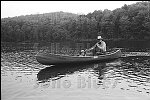 Pop artist Tom Wesselman canoes with his daughter at his upstate New York home.<br>New York USA 8/74<br>0267-23<br>From SoHo Blues - A Personal Photographic Diary of New York City in the 1970s by SoHo Weekly News chief photographer Allan Tannenbaum