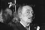 Surrealist Painter Salvador Dali balances his cane on his head at the St. Regis hotel<br>NYC 3/74<br>0101-22<br>From SoHo Blues - A Personal Photographic Diary of New York City in the 1970s by SoHo Weekly News chief photographer Allan Tannenbaum