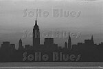 Lightless skyline of New York City during the 1977 blackout, viewed from New Jersey, 7/14/77<br>1658-07<br>From SoHo Blues - A Personal Photographic Diary of New York City in the 1970s by SoHo Weekly News chief photographer Allan Tannenbaum