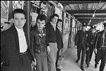 The Cure gets caught on Columbus Ave.<br>NYC 4/11/80<br>3002-27<br>From SoHo Blues - A Personal Photographic Diary of New York City in the 1970s by SoHo Weekly News chief photographer Allan Tannenbaum