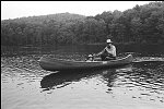 Pop artist Tom Wesselman canoes with his daughter at his upstate New York home.<br>New York USA 8/74<br>0267-23<br>From SoHo Blues - A Personal Photographic Diary of New York City in the 1970s by SoHo Weekly News chief photographer Allan Tannenbaum