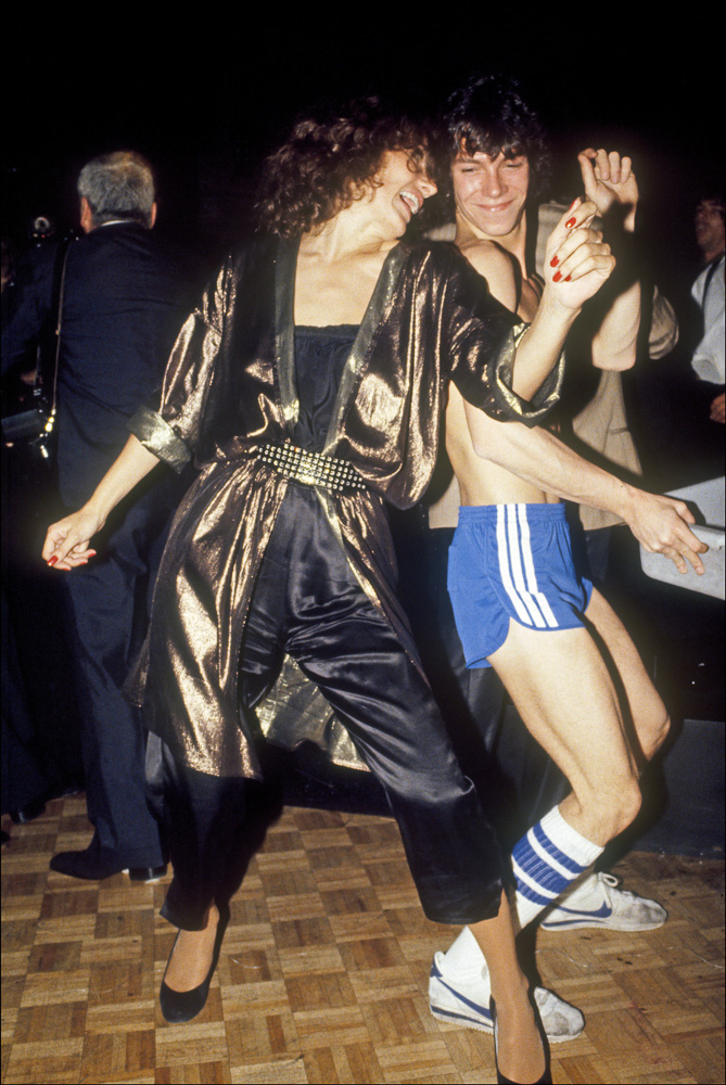 Maggie Trudeau dances with a busboy at Studio 54