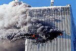 Two hijacked planes crash into the World Trade Center towers. Both towers burn, then collapse. Many people were injured and over 5,000 died. NYC 9/11/01