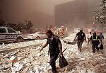 Two hijacked planes crash into the World Trade Center towers. Both towers burn, then collapse. Many people were injured and over 5,000 died. NYC 9/11/01