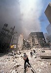 Two hijacked planes crash into the World Trade Center towers. Both towers burn, then collapse. Many people were injured and over 5,000 died. NYC 9/11/01