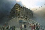 Two hijacked planes crash into the World Trade Center towers. Both towers burn, then collapse. Many people were injured and over 5,000 died. NYC 9/11/01