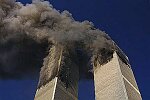 Two hijacked planes crash into the World Trade Center towers. Both towers burn, then collapse. Many people were injured and over 5,000 died. NYC 9/11/01