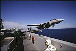 A U.S. Navy F-14 launches from the U.S.S. George Washington during the Iraqi Crisis, February 1998