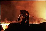 A worker opens a sluice gate in a steel mill in Eisenhuttenstadt, East Germany, 1989