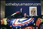 Amazon.com CEO Jeff Bezos in the Austin Powers Shagmobile after announcing joint venture with Sotheby',s 2000