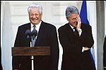 President Bill Clinto laughs uncontrollably at a joke made by Russian President Boris Yeltsin at a summit at FDR's home in Hyde Park, NY, 1995