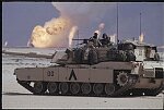 A U.S. Army M1A1 Abrams main battle tank in the burning oil fields of Kuwait, Operation Desert Storm, 1991